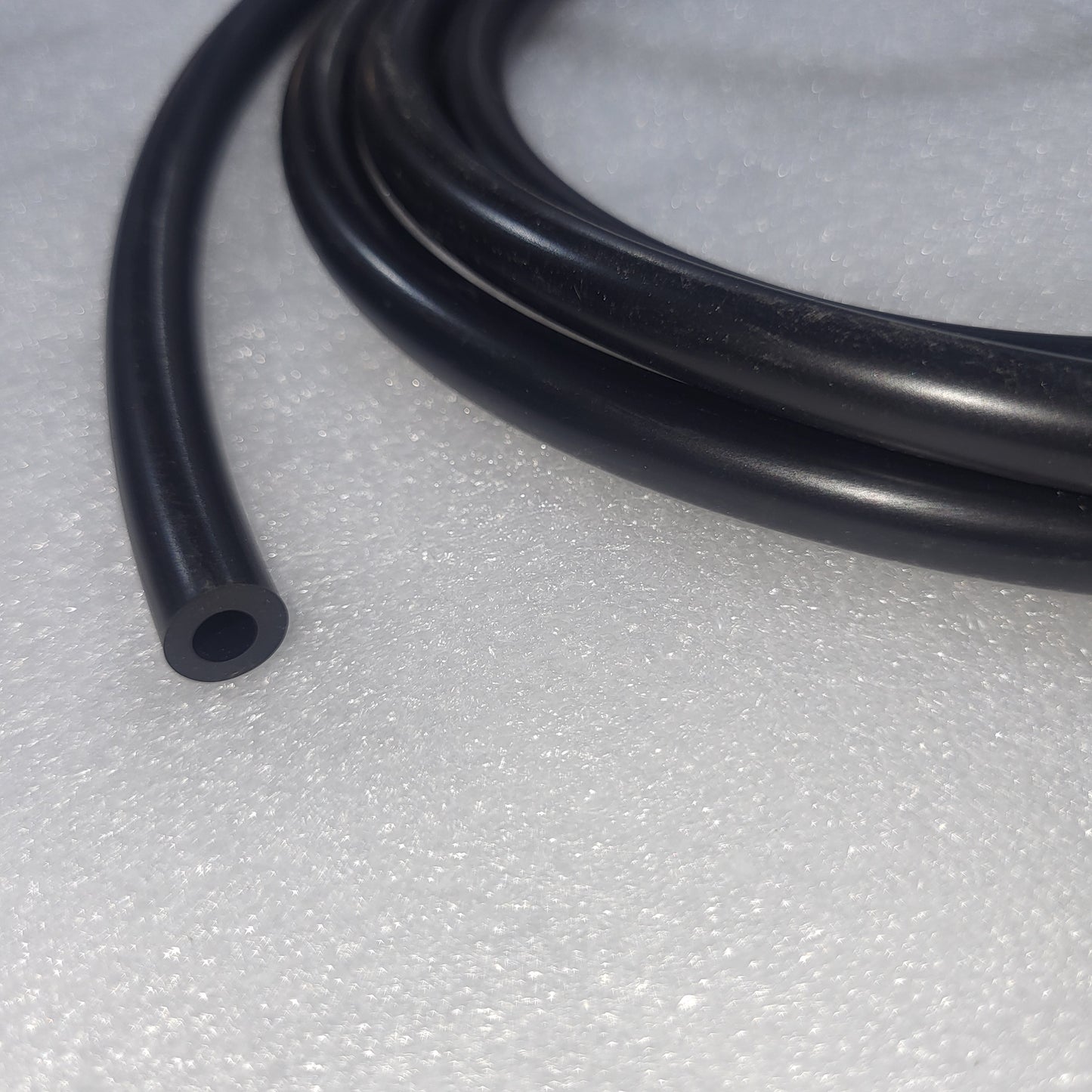 Push on Neoprene tube to connect reservoir to pumps.